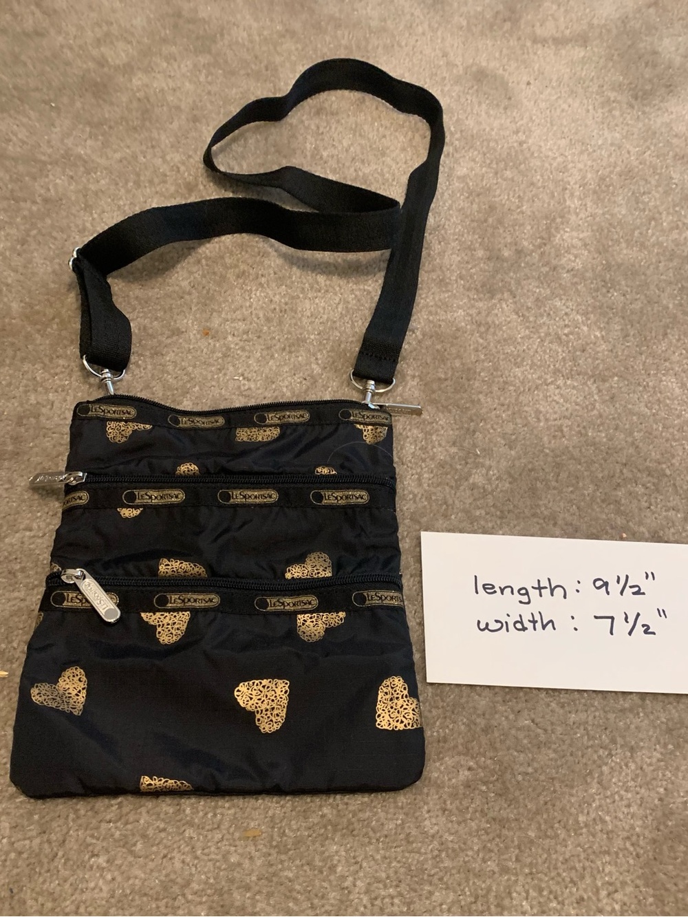 LeSportsac Black Crossbody Bag with Gold Heart Motif